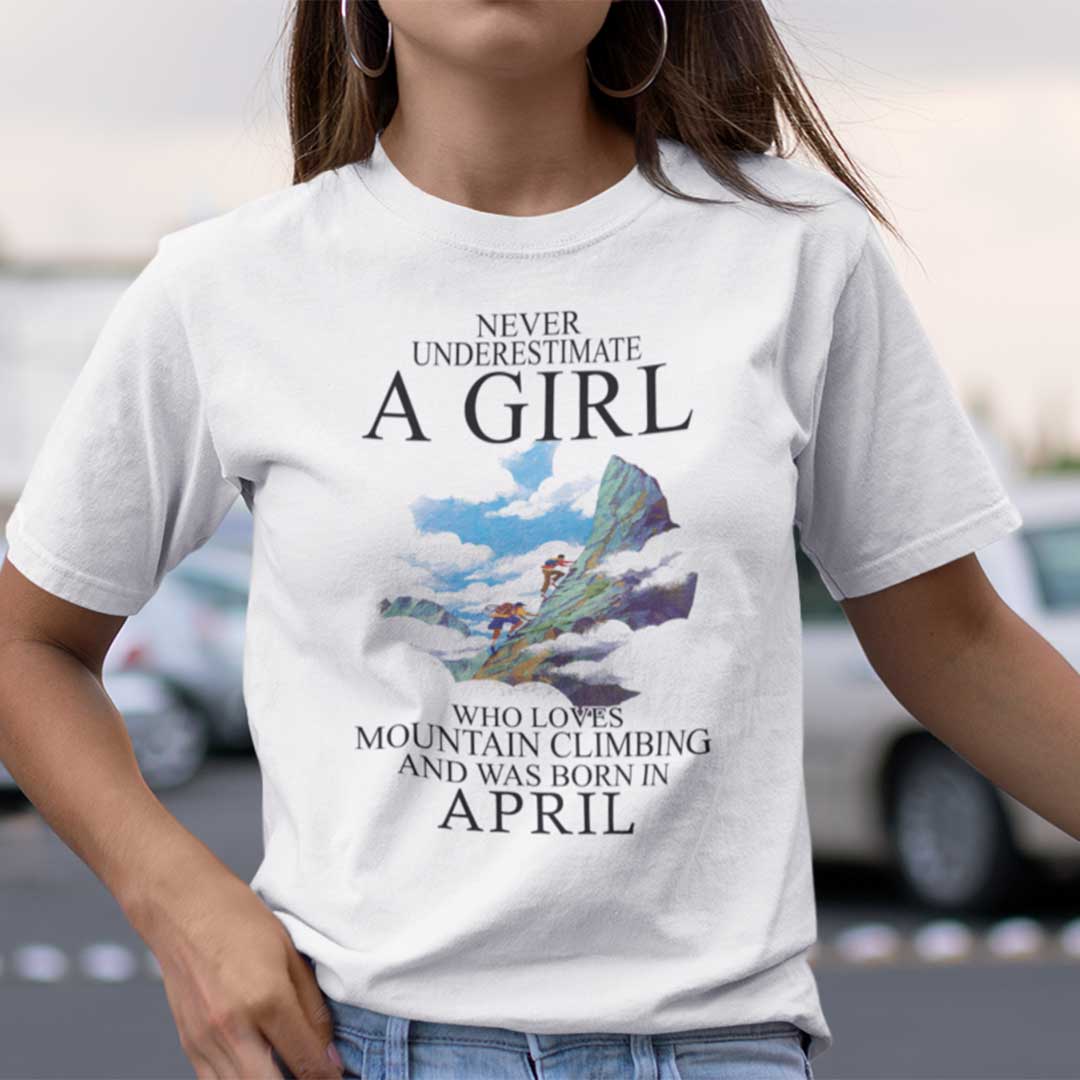 Never Underestimate A Girl Who Loves Mountain Climbing And Was Born In April Shirt.jpg