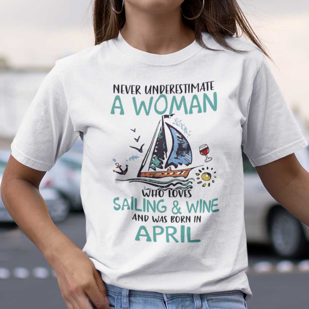 Never Underestimate A Woman Who Loves Sailing And Wine Shirt April.jpg