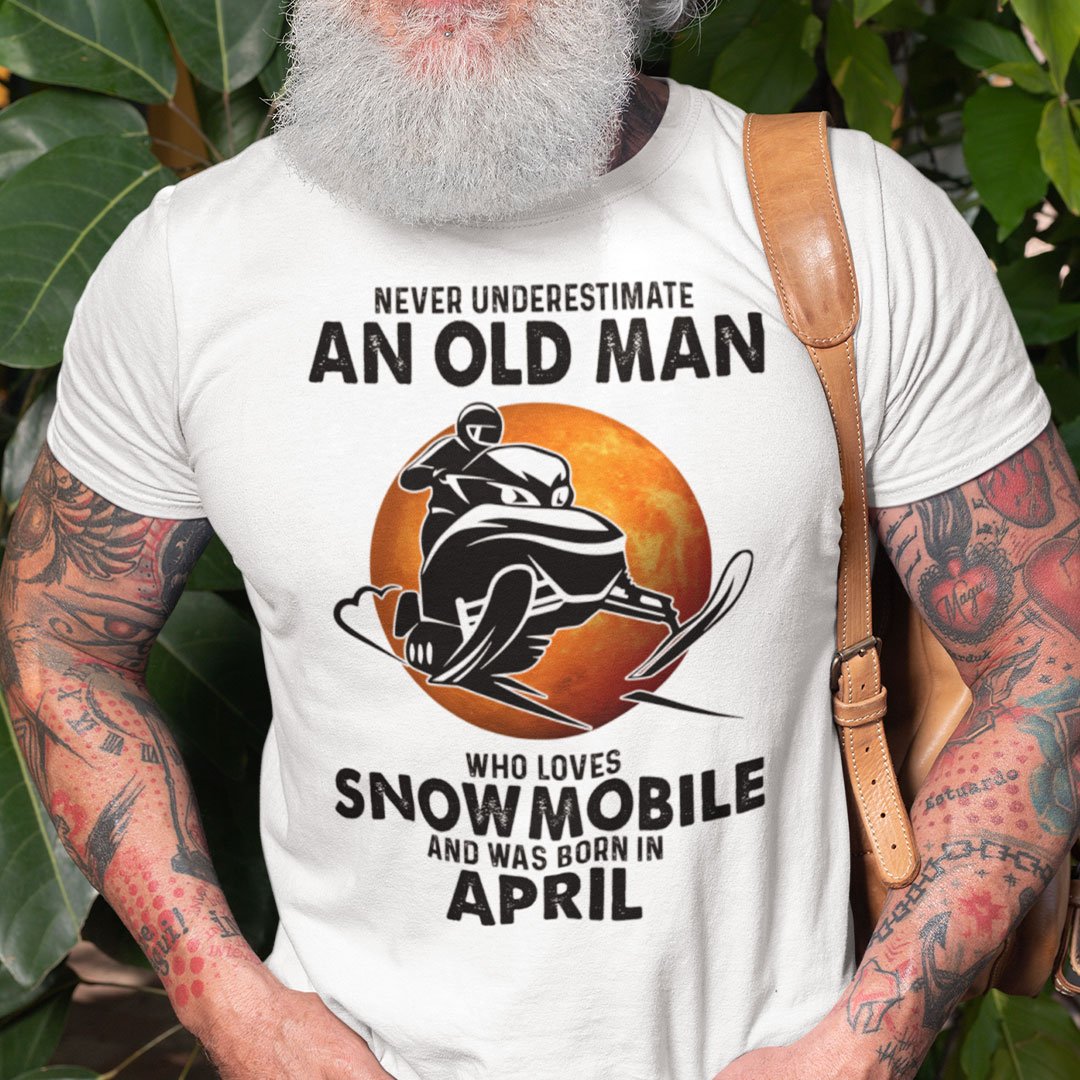 An Old Man Who Loves Snowmobile Shirt Born In April.jpg