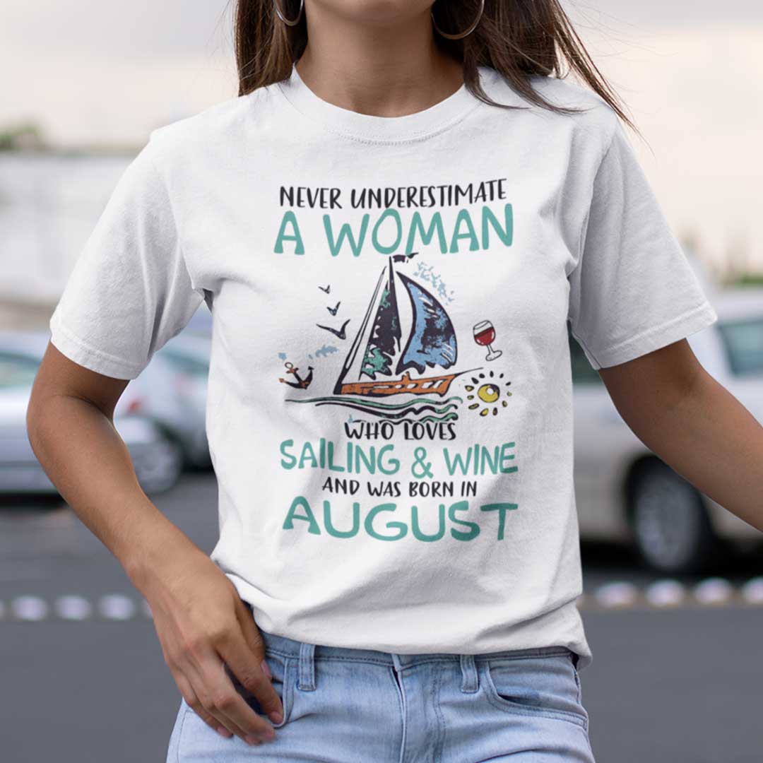Never Underestimate A Woman Who Loves Sailing And Wine Shirt August.jpg