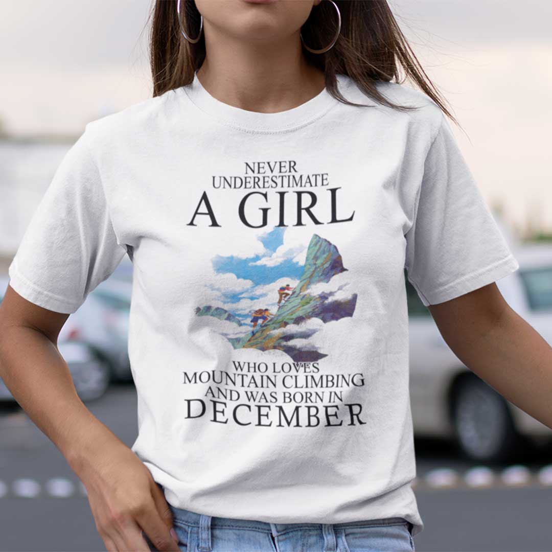 Never Underestimate A Girl Who Loves Mountain Climbing And Was Born In December Shirt.jpg