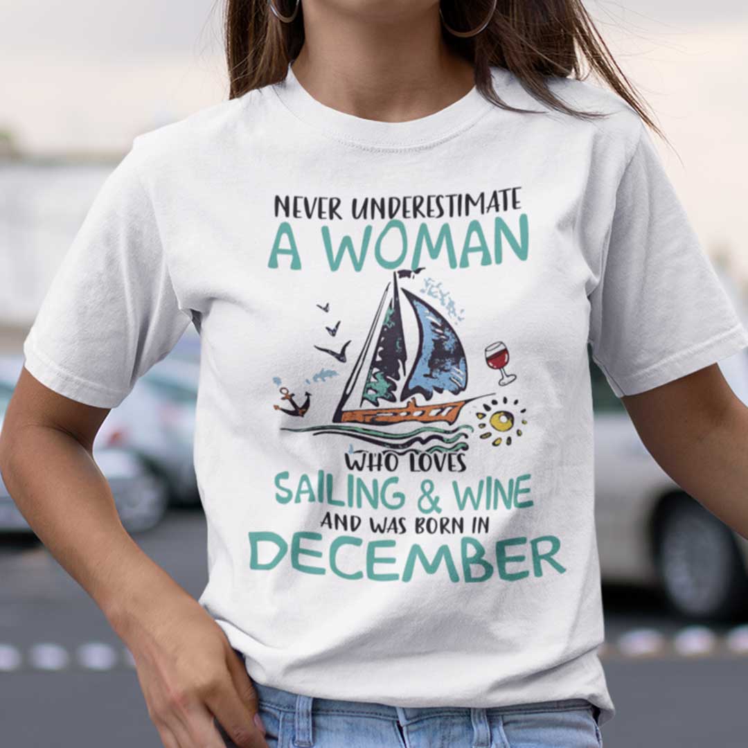 Never Underestimate A Woman Who Loves Sailing And Wine Shirt December.jpg