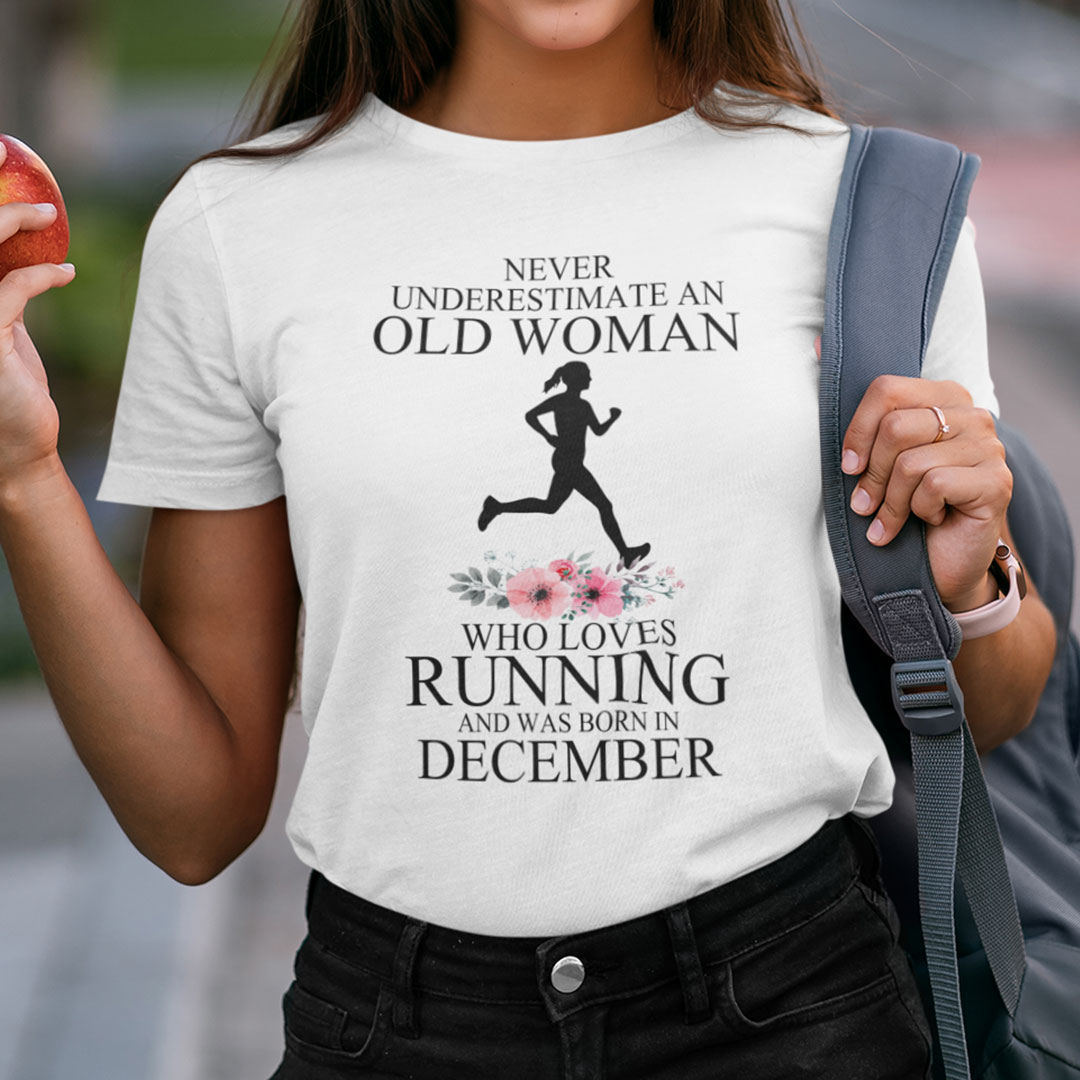 Never Underestimate Old Woman Who Loves Running Shirt December.jpg