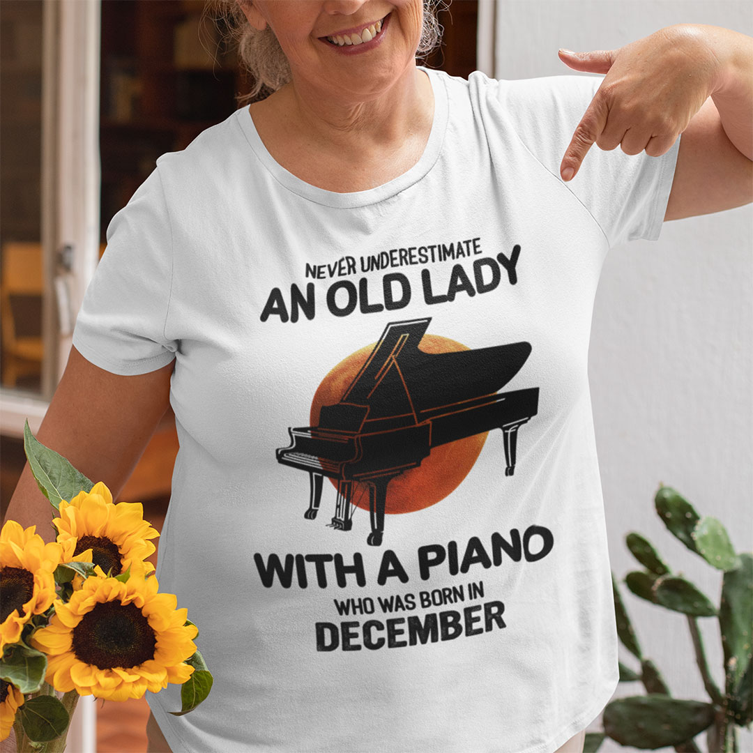 Never Underestimate An Old Lady With A Piano Shirt December.jpg