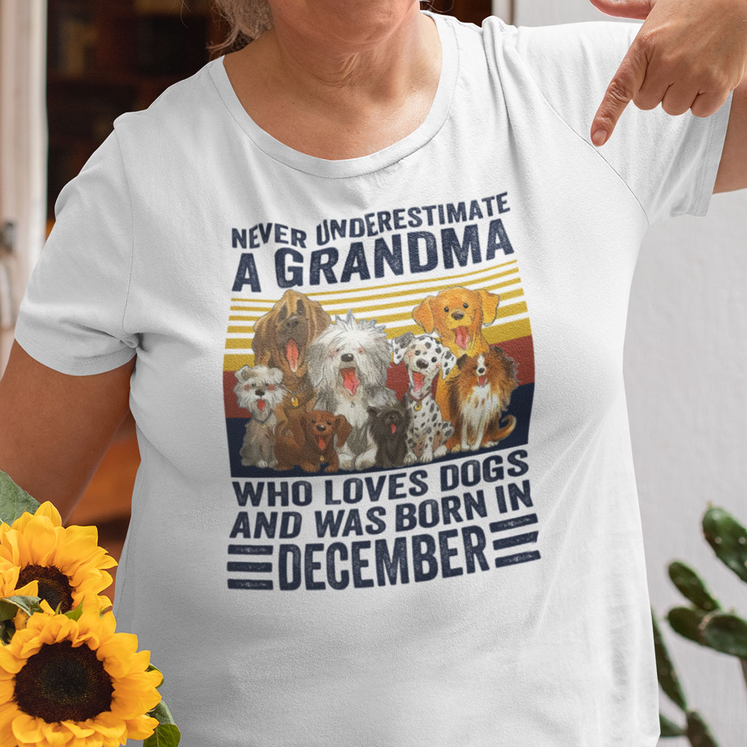 Never Underestimate A Grandma Who Loves Dogs December Shirt.jpg