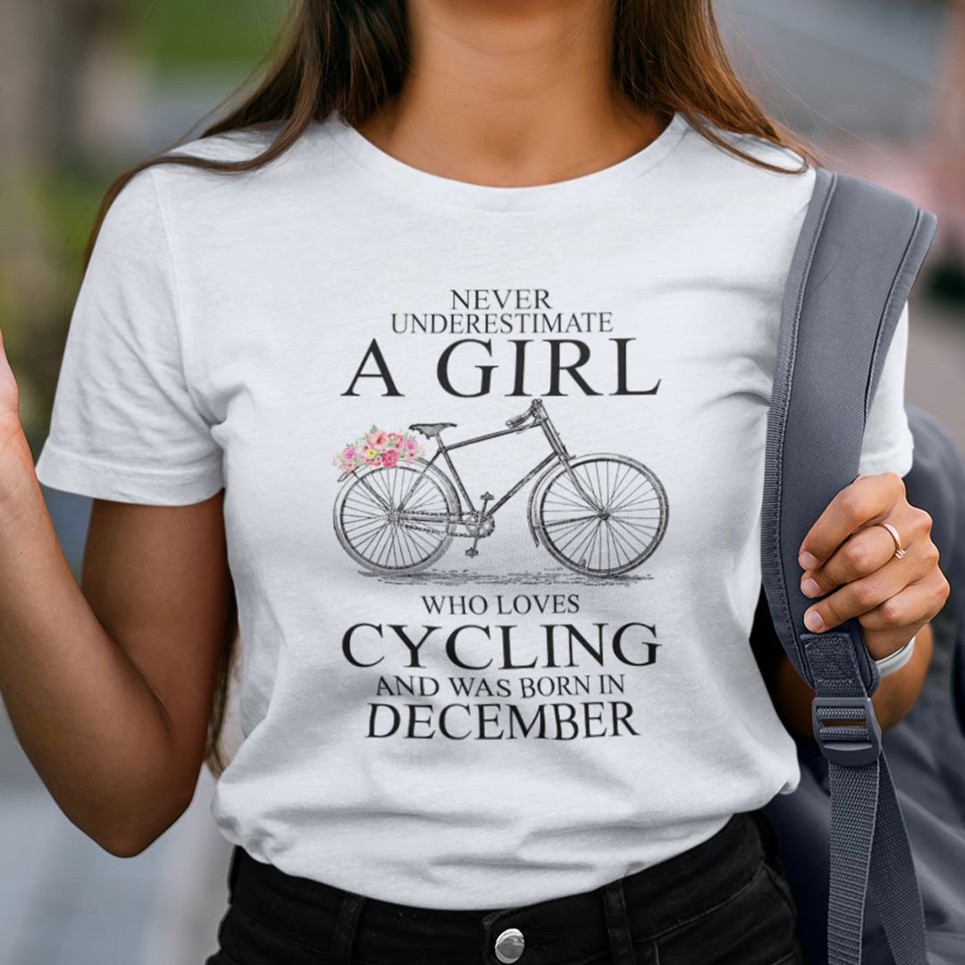 Never Underestimate A Girl Who Loves Cycling December Shirt.jpg