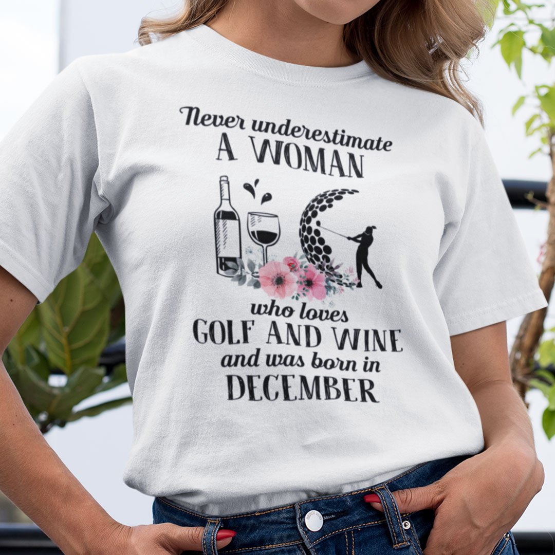Never Underestimate Woman Loves Golf And Wine Shirt December.jpg