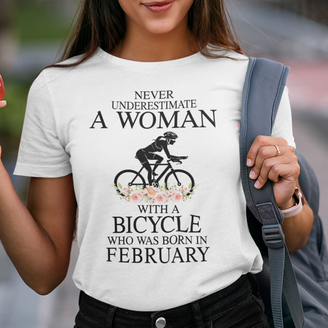 Never Underestimate A Woman With A Bicycle Shirt February.jpg