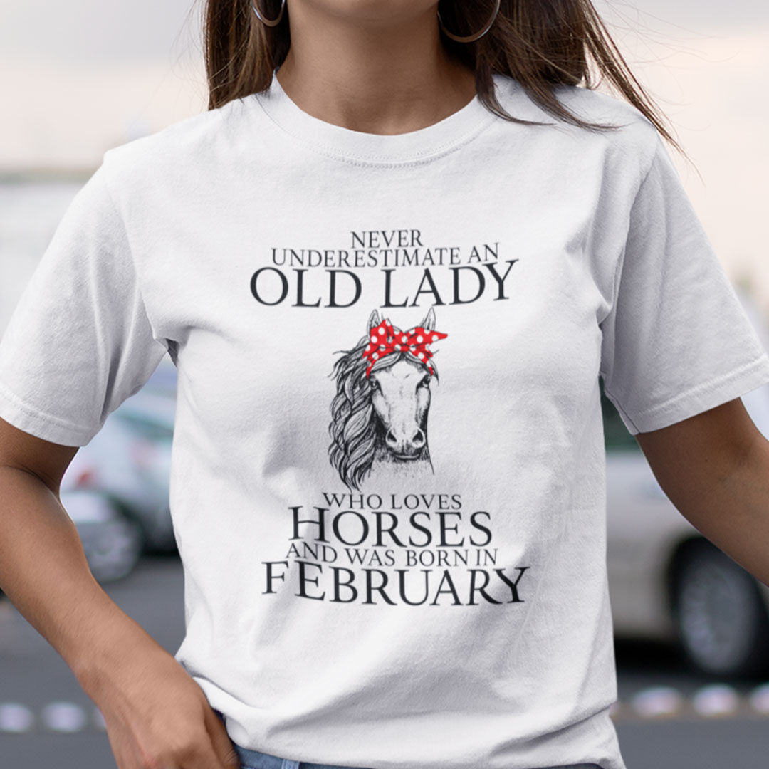 Never Underestimate Old Lady Loves Horses Born In February Shirt.jpg
