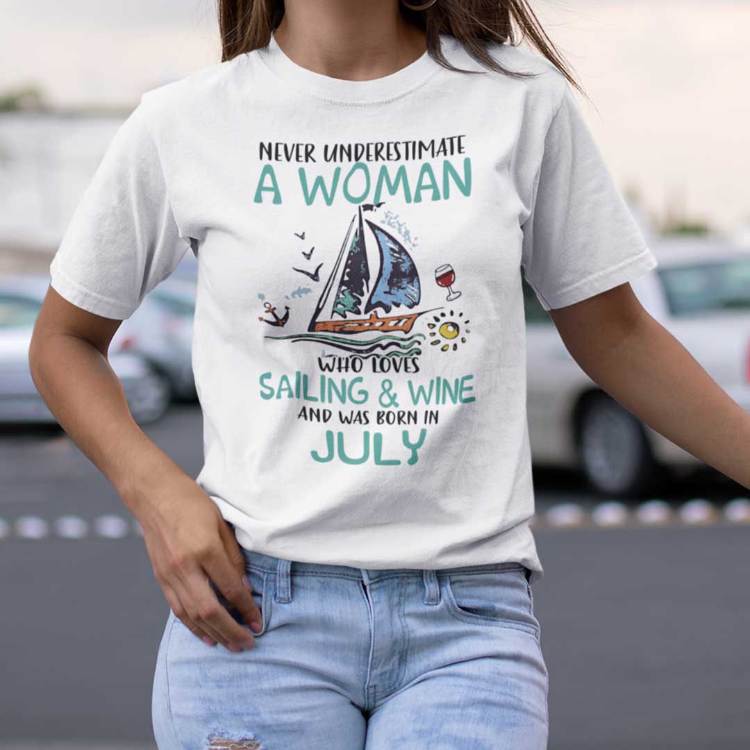 Never Underestimate A Woman Who Loves Sailing And Wine Shirt July.jpg