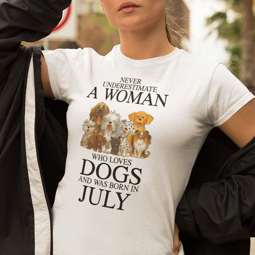 A Woman Who Loves Dogs And Was Born In July Shirt.jpg