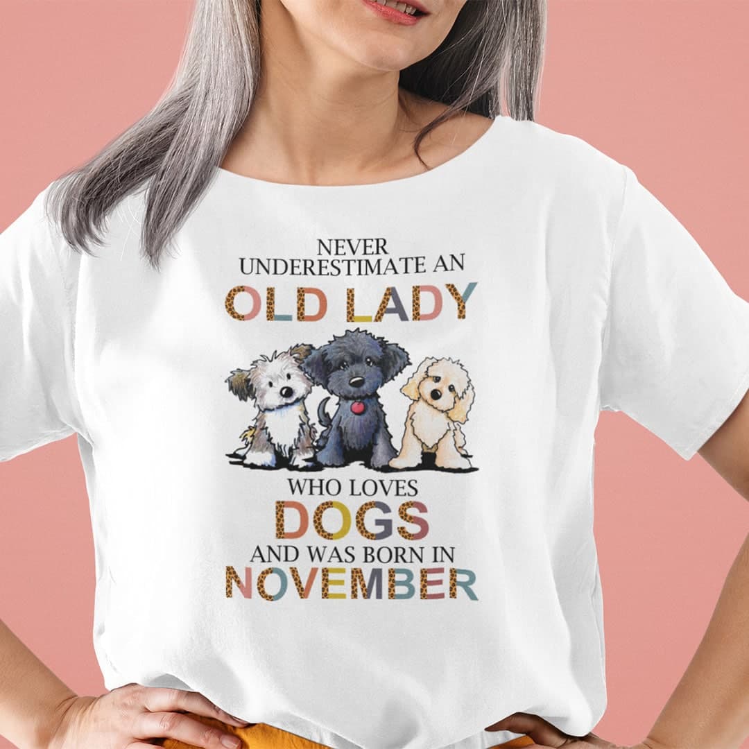 Never Underestimate An Old Lady Who Loves Dogs Shirt November.jpg