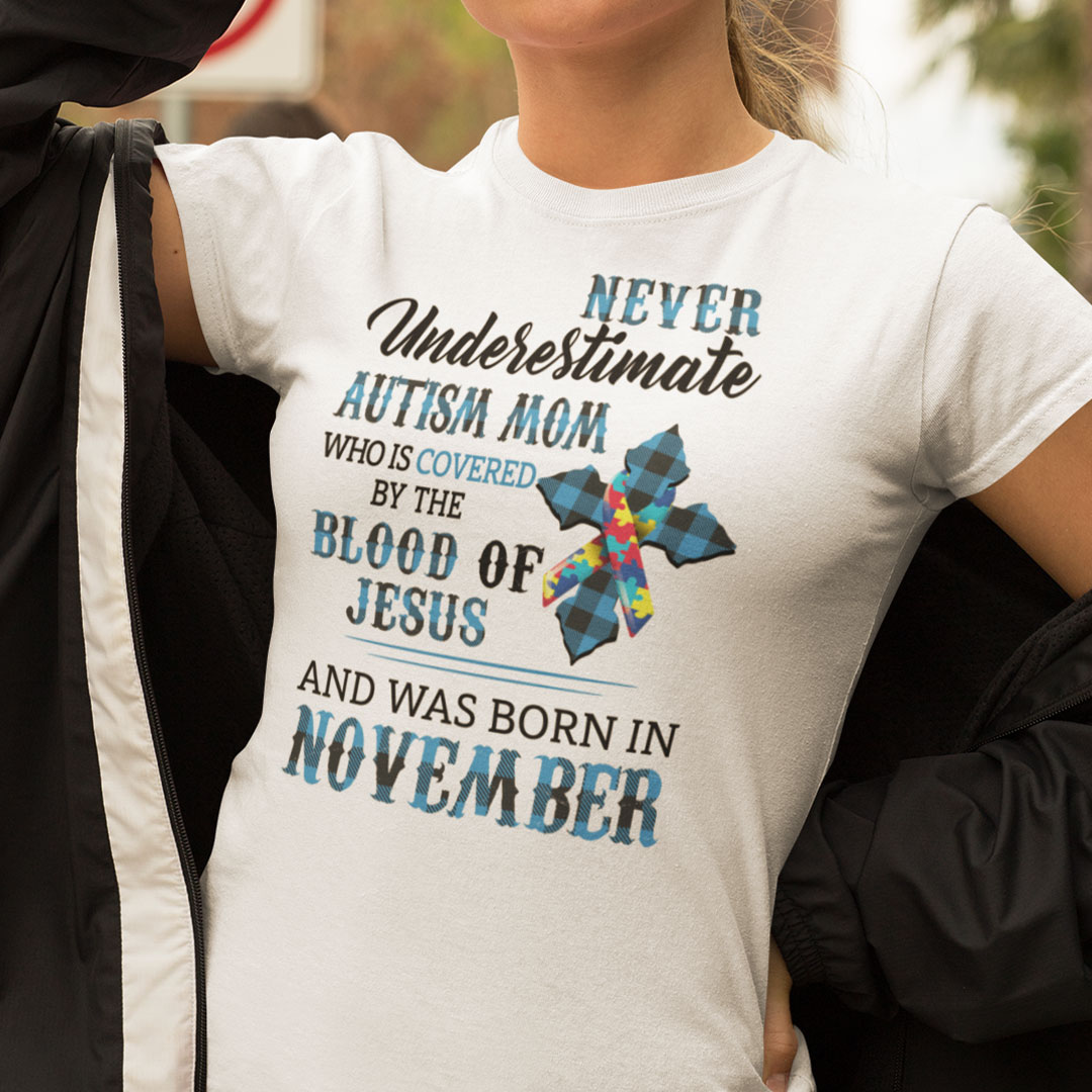 Never Underestimate Autism Mom Covered By Blood Of Jesus Shirt November.jpg