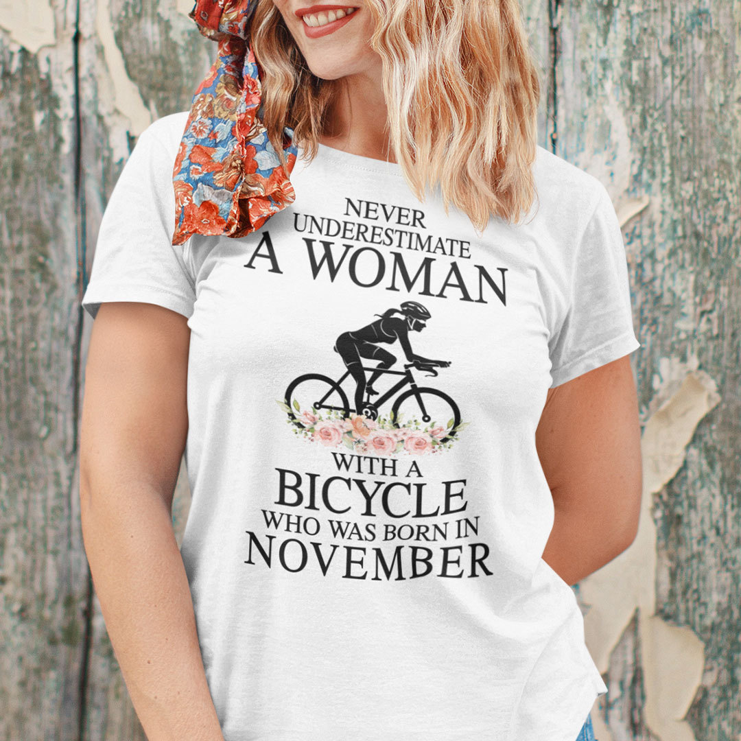 Never Underestimate A Woman With A Bicycle Shirt November.jpg