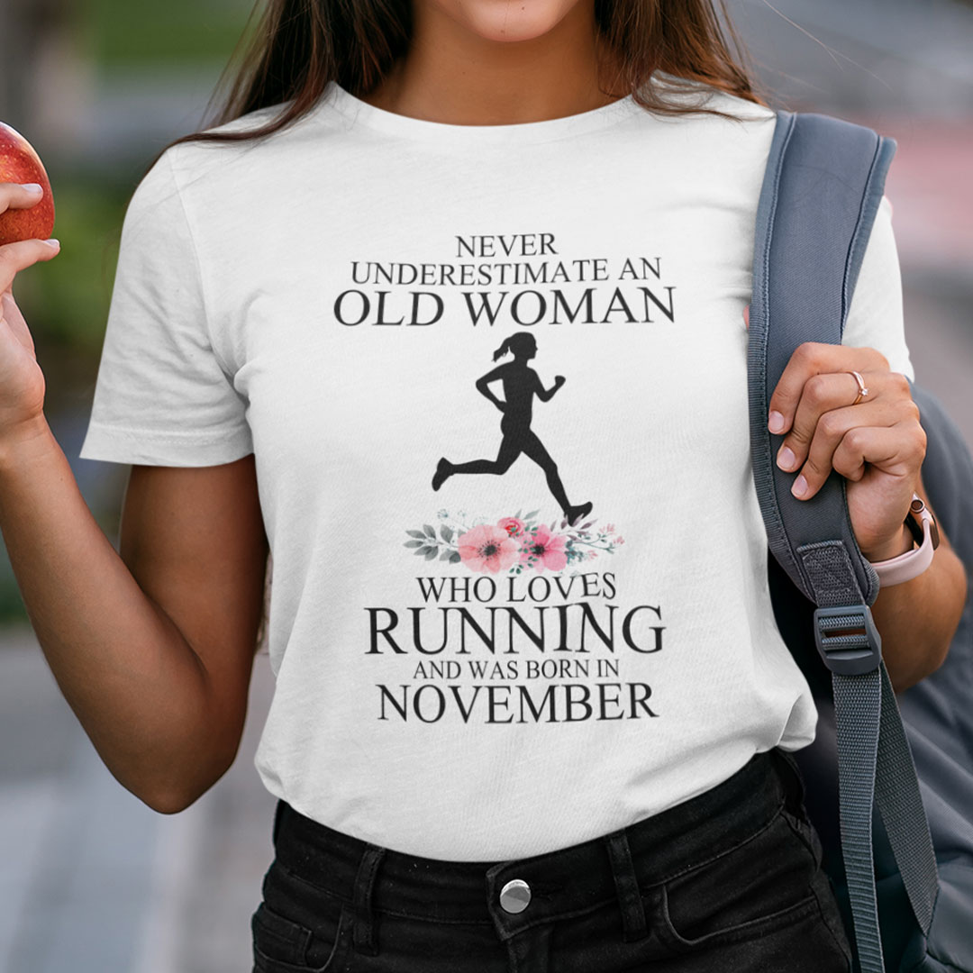 Never Underestimate Old Woman Who Loves Running Shirt November.jpg