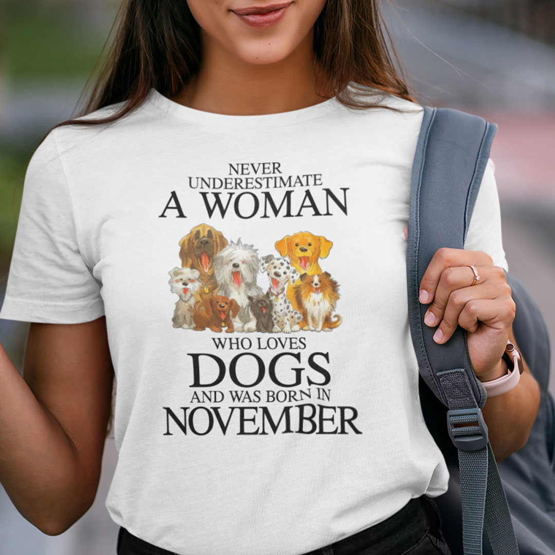 Never Underestimate Woman Loves Dogs Born In November Shirt.jpg
