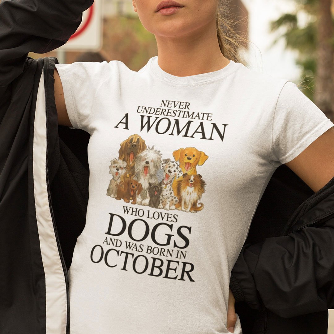 A Woman Who Loves Dogs And Was Born In October Shirt.jpg