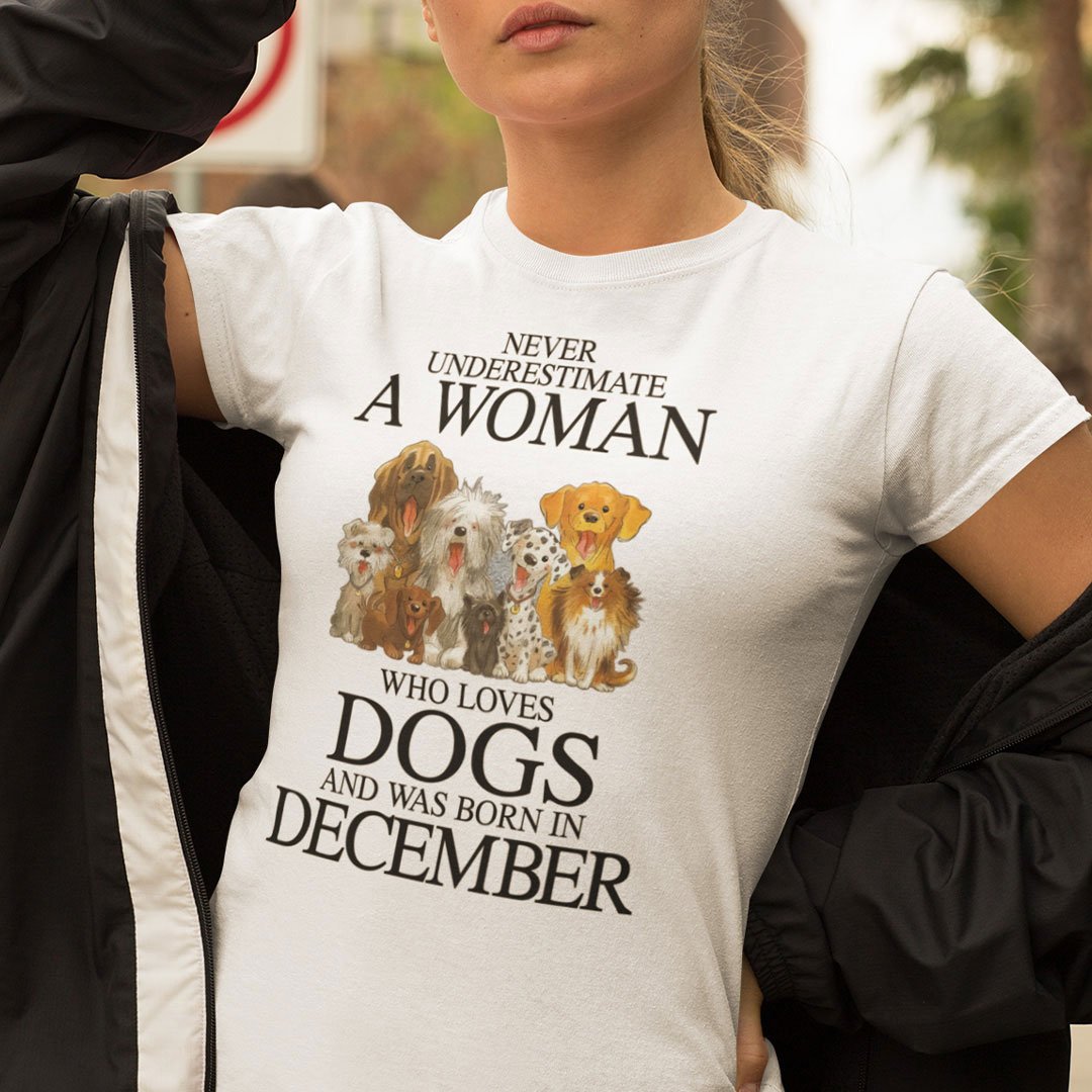 A Woman Who Loves Dogs And Was Born In December Shirt.jpg