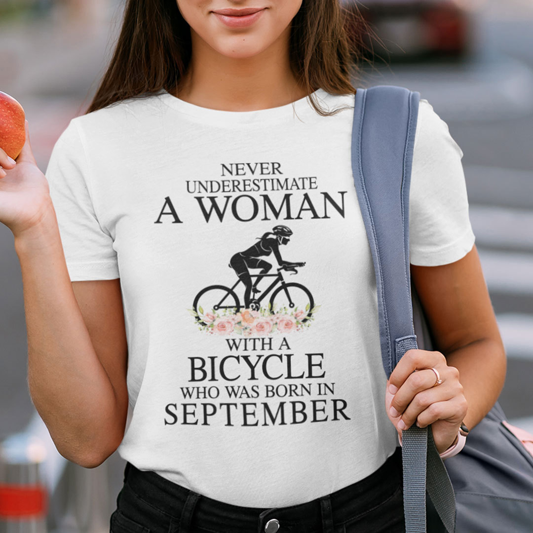 Never Underestimate A Woman With A Bicycle Shirt September.jpg