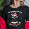 On The Naughty List And I Regret Nothing Shirt Black Cat Santa.jpg