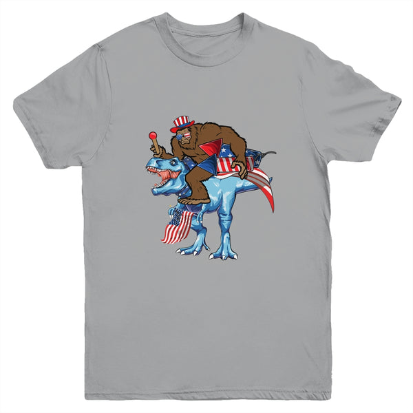 Bigfoot riding Dinosaur USA Flag 4th Of July America Youth Youth T Shirt Sport Grey 600x 2.jpg