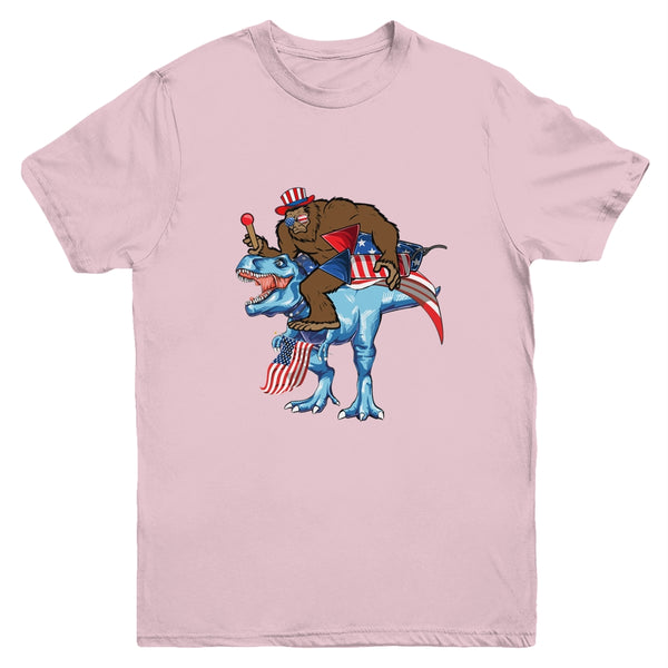 Bigfoot riding Dinosaur USA Flag 4th Of July America Youth Youth T Shirt Light Pink 600x 3.jpg