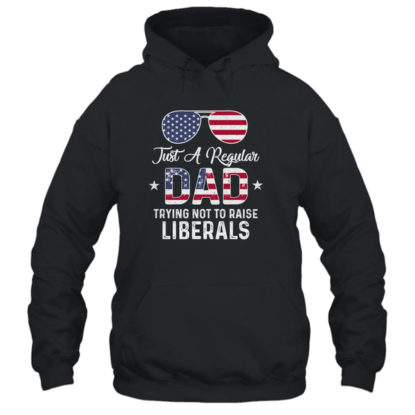 Just A Regular Dad Trying Not To Raise Liberals Republican Pullover Hoodie Black 600x.jpg