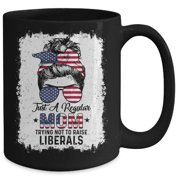 Just A Regular Mom Trying Not To Raise Liberals US Flag Mug 15oz Mug Black 45a56a8d 7d11 4945 b424 f05694748242 600x.jpg
