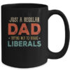 Just A Regular Dad Trying Not To Raise Liberals Vintage Mug 15oz Mug Black 71c9191b 89c3 4410 9af6 c5da53af0139 600x 2.jpg