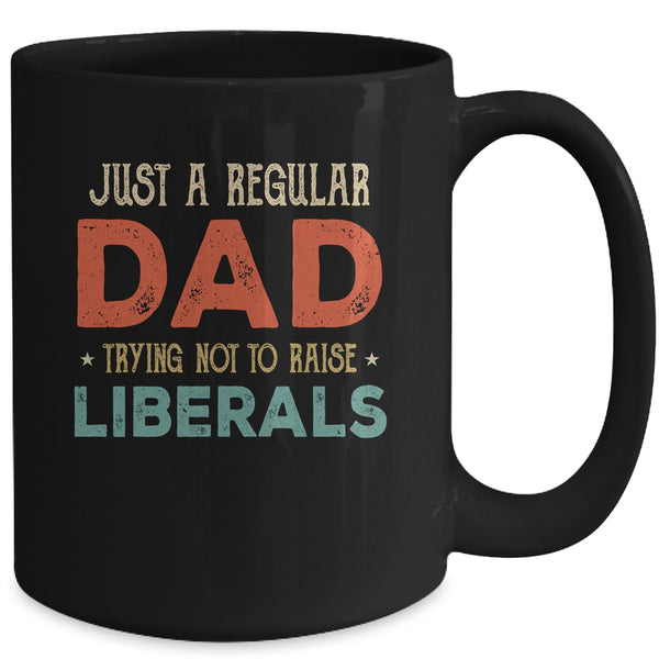Just A Regular Dad Trying Not To Raise Liberals Vintage Mug 15oz Mug Black 71c9191b 89c3 4410 9af6 c5da53af0139 600x 2.jpg
